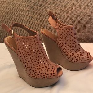 Size 8.5 Light orange/ peach beige wedges.